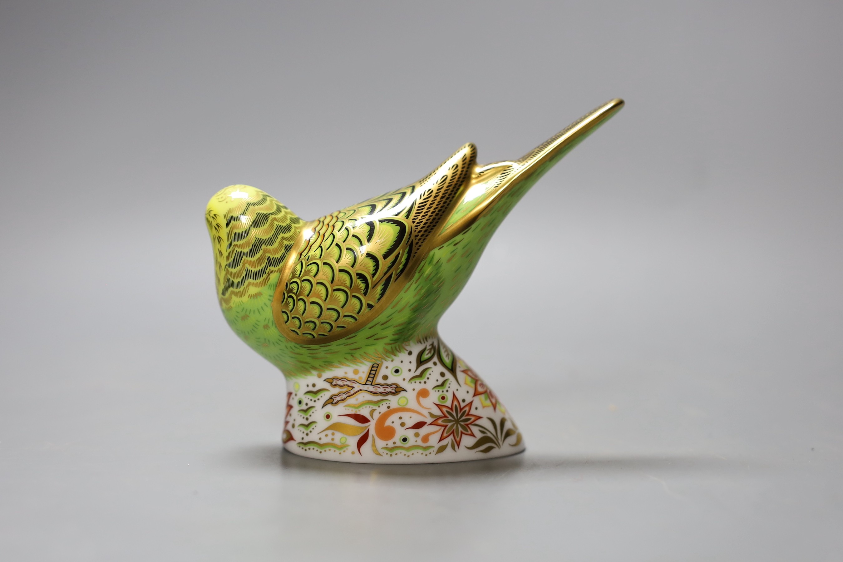 A Royal Crown Derby paperweight - Green Budgerigar, gold stopper, boxed, no certificate